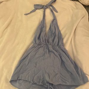 Blue backless romper-size small. Never worn